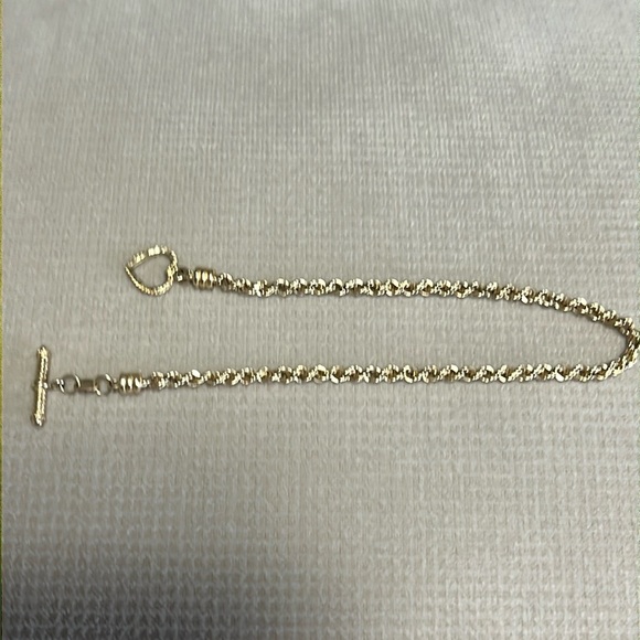 Beautiful 14 kt yellow gold rope bracelet heart toggle closure. Approx 2.46 g. - Picture 2 of 13